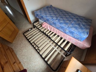 Cama nido. Conjunto somier y  colchón con cabecero