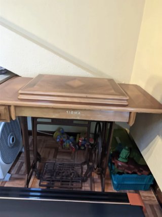 Máquina de coser verde