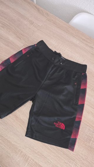 Pantalones The North Face negros y rojos
