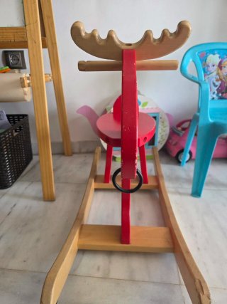 Rinoceronte di legno per dondolare
