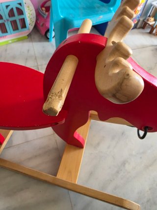 Rinoceronte di legno per dondolare