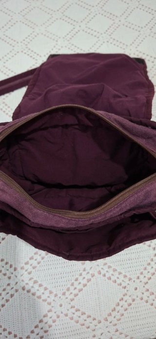 Bolso morado con sol bordado