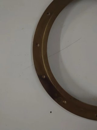 Ojo de buey de bronce