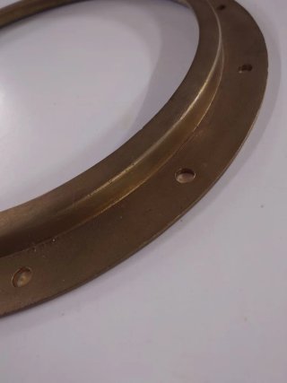 Ojo de buey de bronce