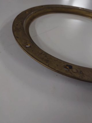 Ojo de buey de bronce