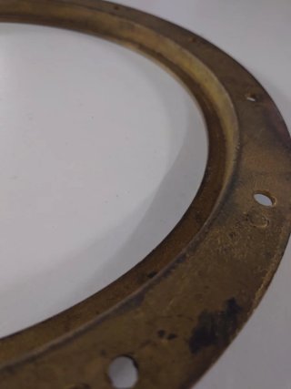 Ojo de buey de bronce