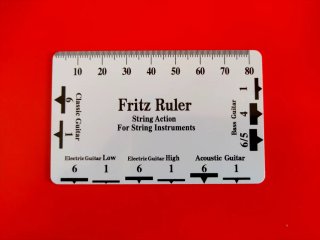 Regla de doble escala para ajuste de guitarras
