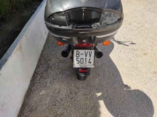 Honda CB250 Roja con Baúl Negro, 34000 kilómetros