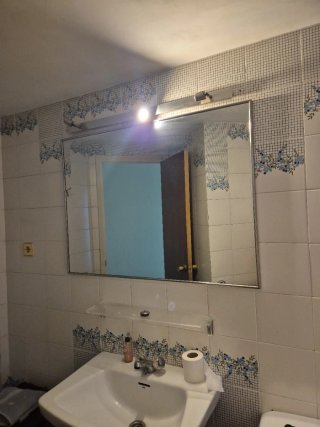 Espejo de baño con marco metalico