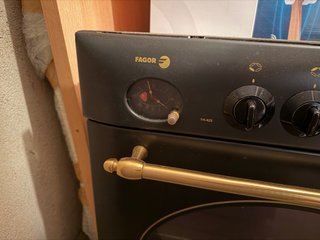 Horno Fagor Negro con Asa Dorada
