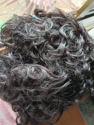 Peluca natural rizada negra