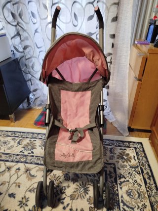 Silla de paseo para muñecas rosa