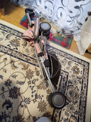 Silla de paseo para muñecas rosa