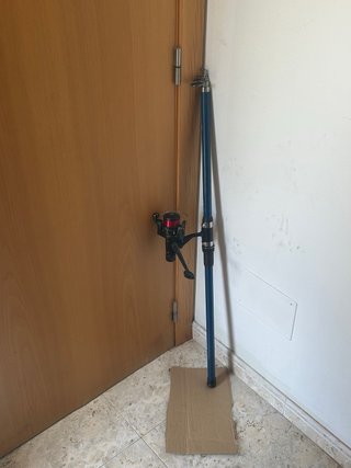 Caña de pescar con carrete
