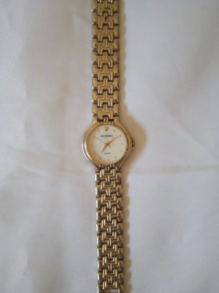 Reloj CELESEN Pulsera Oro y Plata