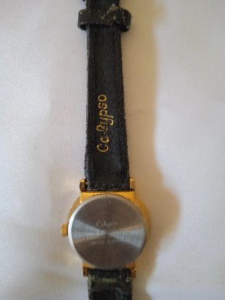 Reloj de pulsera Calypso dorado y negro