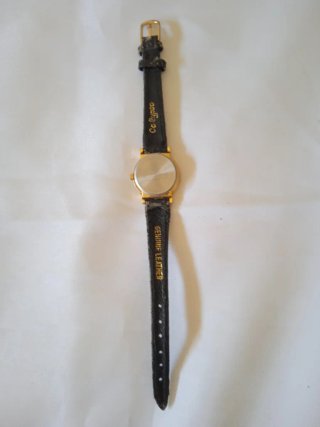 Reloj de pulsera Calypso dorado y negro