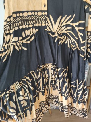 Vestido maxi camisero con vuelo