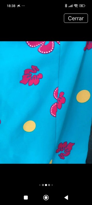 Traje de flamenca azul y rosa