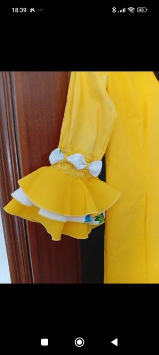 Traje de flamenca amarillo y verde