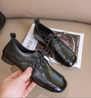 Zapatos negros de cordones