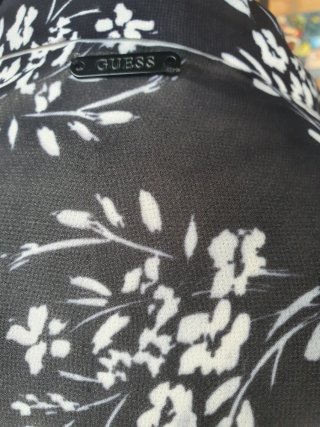 Blusa floral transparente