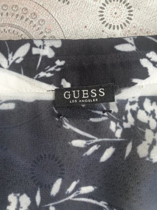 Blusa floral transparente