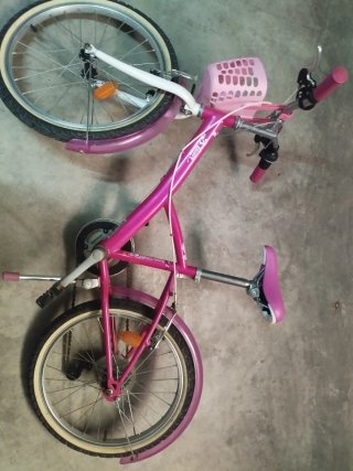 Bicicleta niña rosa con cesta