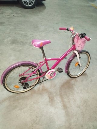 Bicicleta niña rosa con cesta