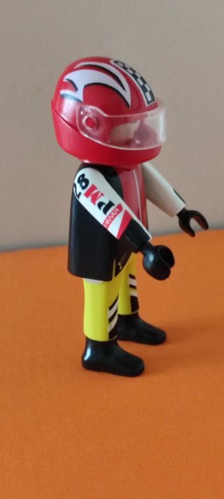 Piloto de moto de carreras Playmobil