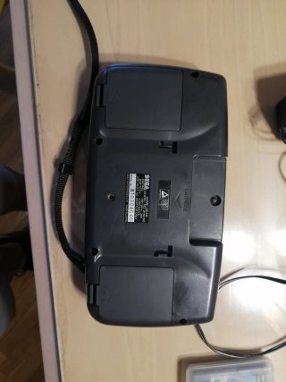Sega Game Gear gris con cargador
