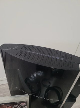 Ps3 75gb con mandos y juego