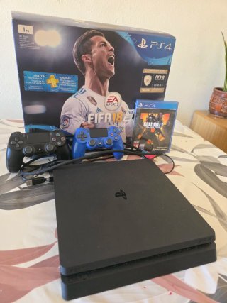 PS4 Slim 1TB Negra + 2 mandos+call of duty