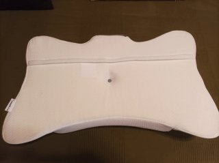Almohada cervical y cuello azul/gris.