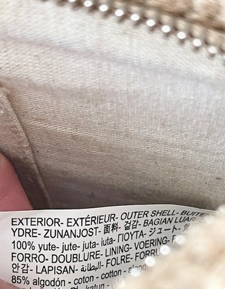 Cartera yute con borla Zara