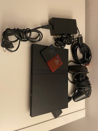PlayStation 2 Slim Nera + 2 Giochi