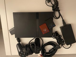 PlayStation 2 Slim Nera + 2 Giochi