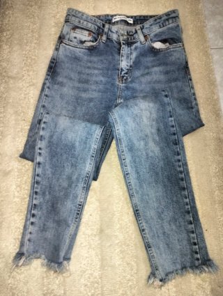 Pantalón vaquero jeans desgastado con cremallera