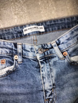 Pantalón vaquero jeans desgastado con cremallera