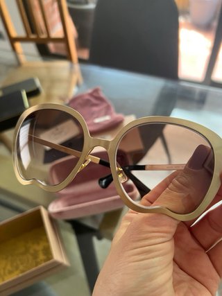 Gafas de sol Miu Miu Marrón y Dorado