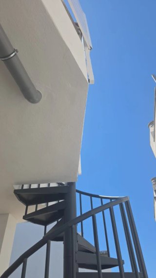 Escalera caracol exterior metal