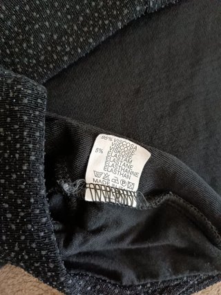 Coprispalle nero e laminato