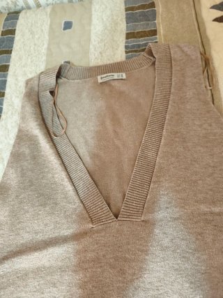 Chaleco Stradivarius beige
