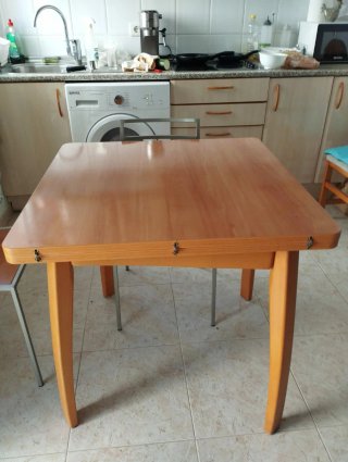 Mesa de comedor extensible de madera