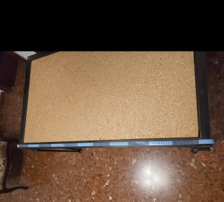 Tavolo in ferro battuto con piano in legno e vetro