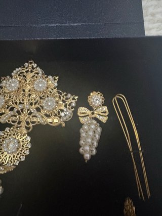 Aderezo de racimo color oro