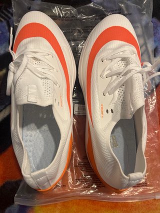 Zapatillas running blancas y naranjas T44