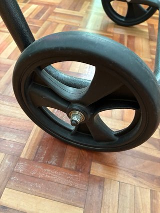 Andador con asiento.