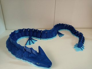Figura dragón articulado azul