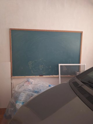 Pizarra verde con marco de madera